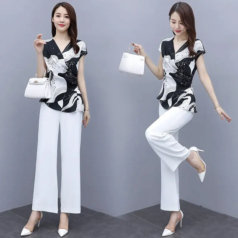 2022 Summer Women Fashion 2 Piece Sets Female V-neck Print Chiffon Shirt Tops Ladies High Waist Loose Wide Leg Pants Suits W99
2022 Summer Women Fashion 2 Piece Sets Female V-neck Print Chiffon Shirt Tops Ladies High Waist Loose Wide Leg Pants Suits W99