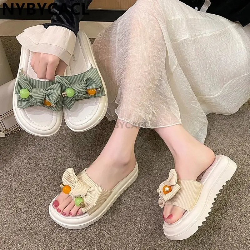 New Thick-soled Fashion Head Wedge-heeled Slippers Women's Summer New In-line Waterproof Platform High-heeled Bow Sandals Women
New Thick-soled Fashion Head Wedge-heeled Slippers Women's Summer New In-line Waterproof Platform High-heeled Bow Sandals Women