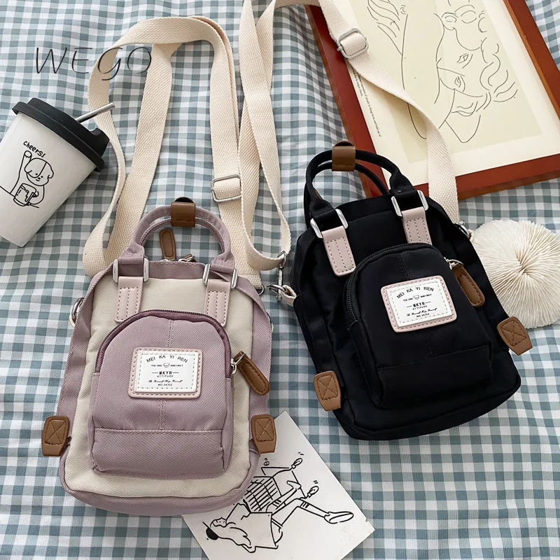 Crossbody bag female mini mobile phone bag 2021 nylon cloth single shoulder ins fashion color matching small bag tide
Crossbody bag female mini mobile phone bag 2021 nylon cloth single shoulder ins fashion color matching small bag tide