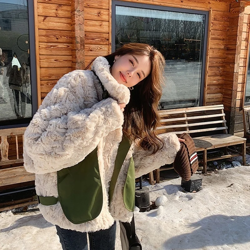 Winter 2022 Thick Warm Rabbit Coat Women Korean Pocket Splicing Outwear Stand Collar Faux Fur Jacket Female Overcoat 
Winter 2022 Thick Warm Rabbit Coat Women Korean Pocket Splicing Outwear Stand Collar Faux Fur Jacket Female Overcoat