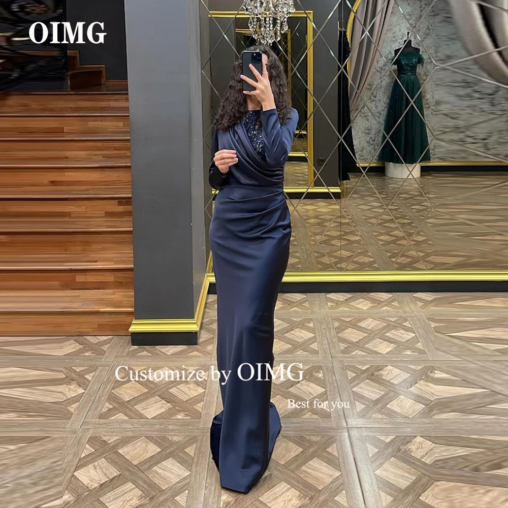 OIMG Modest Dubai Arabic Women Navy Blue Satin Evening Dresses Mermaid Long Sleeves Shiny Beads O-Neck Formal Prom Gowns
OIMG Modest Dubai Arabic Women Navy Blue Satin Evening Dresses Mermaid Long Sleeves Shiny Beads O-Neck Formal Prom Gowns