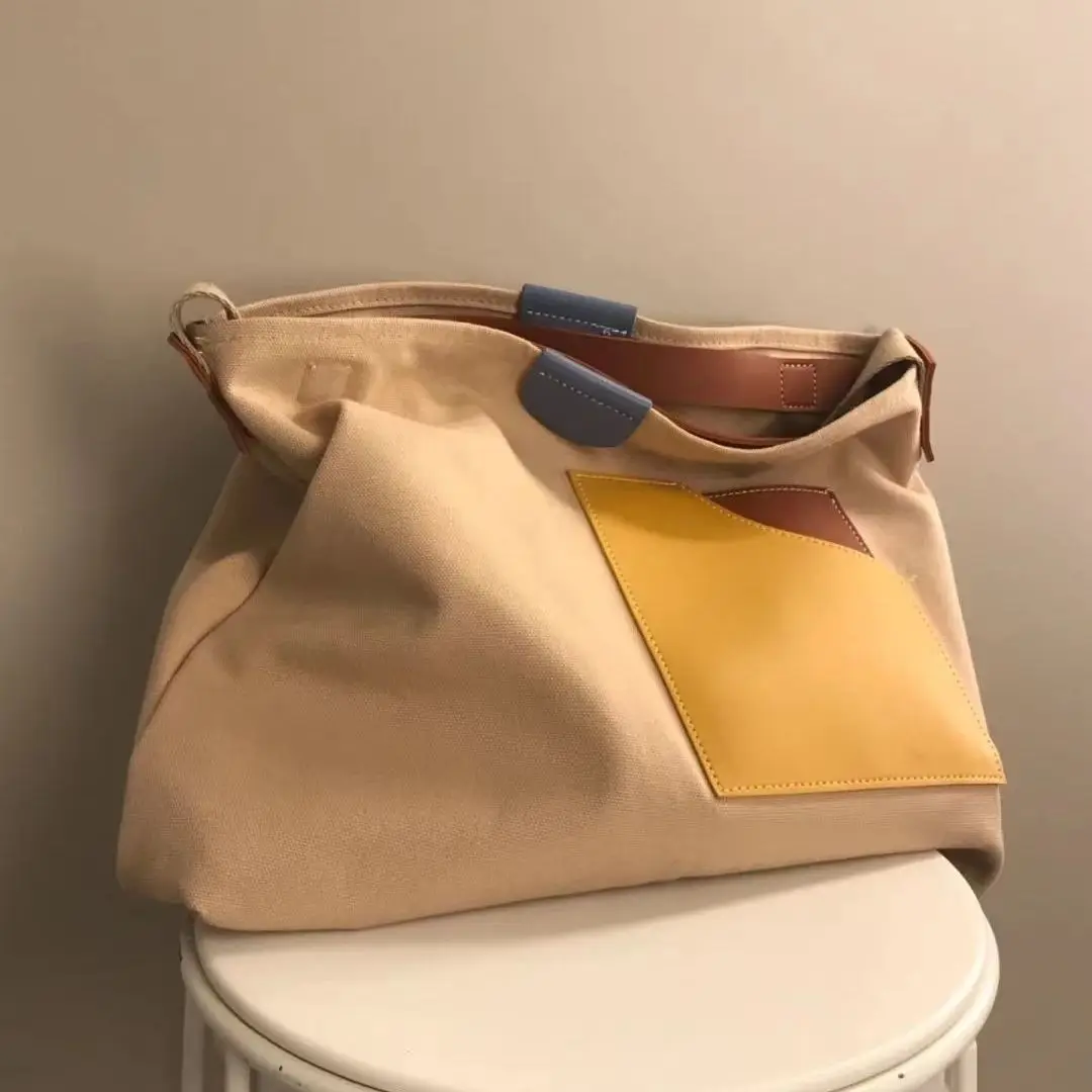 Shoulder Bag Large-capacity Commuter Tote Bag Niche Lazy Canvas Bag Women's 2022 New Fashion All-match
Shoulder Bag Large-capacity Commuter Tote Bag Niche Lazy Canvas Bag Women's 2022 New Fashion All-match
