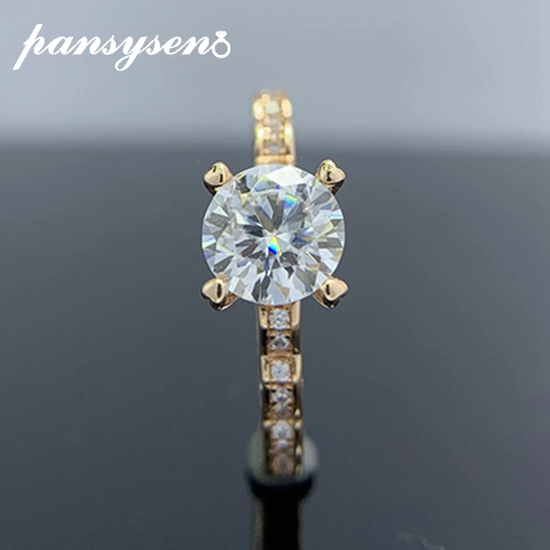 PANSYSEN 925 Sterling Silver 1CT Round Real Moissanite Gemstone Wedding Engagement Rings for Women Rose Gold Color Fine Jewelry
PANSYSEN 925 Sterling Silver 1CT Round Real Moissanite Gemstone Wedding Engagement Rings for Women Rose Gold Color Fine Jewelry