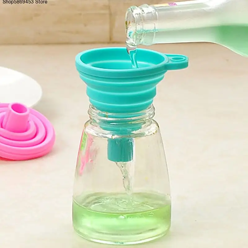 Folding funnel silicone telescopic long multi-function portable liquid high temperature oil leakage household kitchen tools
Folding funnel silicone telescopic long multi-function portable liquid high temperature oil leakage household kitchen tools