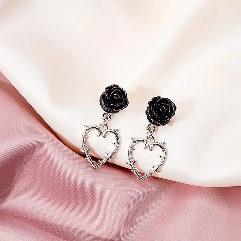 Silver needle thorn rose earrings female dark retro old-fashioned niche personality tassel cold wind long temperament earrings
Silver needle thorn rose earrings female dark retro old-fashioned niche personality tassel cold wind long temperament earrings