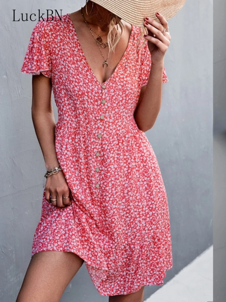V Neck Ruffles Beach Mini Dresses Summer A Line Short Sleeve Boho Holiday Dress Clothes Vintage Floral Printed Dress Women 2022 
V Neck Ruffles Beach Mini Dresses Summer A Line Short Sleeve Boho Holiday Dress Clothes Vintage Floral Printed Dress Women 2022