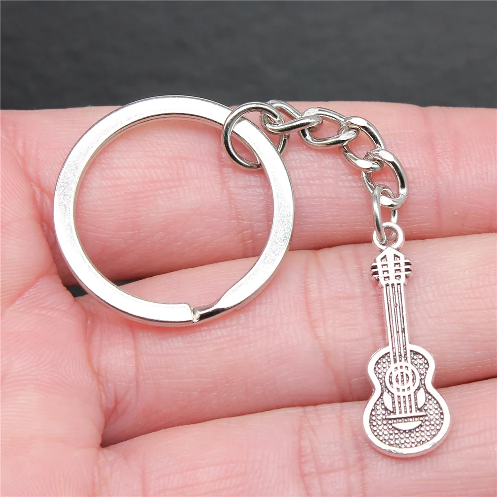 Keychain Holder Dropshipping Vintage Handmade Antique Silver Color 28x10mm Guitar Pendant Keyring
Keychain Holder Dropshipping Vintage Handmade Antique Silver Color 28x10mm Guitar Pendant Keyring