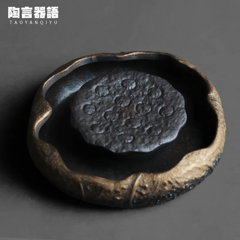 Rock pottery gilt lotus root teapot base rock mine pottery material personality kung fu tea support pot cushion
Rock pottery gilt lotus root teapot base rock mine pottery material personality kung fu tea support pot cushion