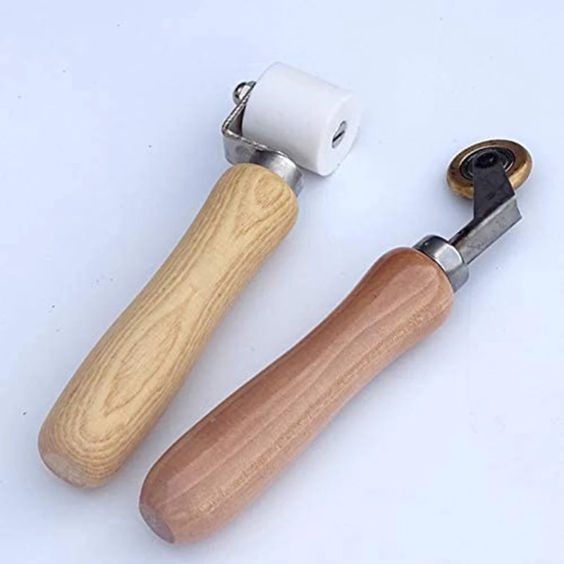 6Mm Brass Penny Roller+28Mm High Temperature Resistant Seam Hand Pressure Roller White (PTFE)Pressure Roller
6Mm Brass Penny Roller+28Mm High Temperature Resistant Seam Hand Pressure Roller White (PTFE)Pressure Roller
