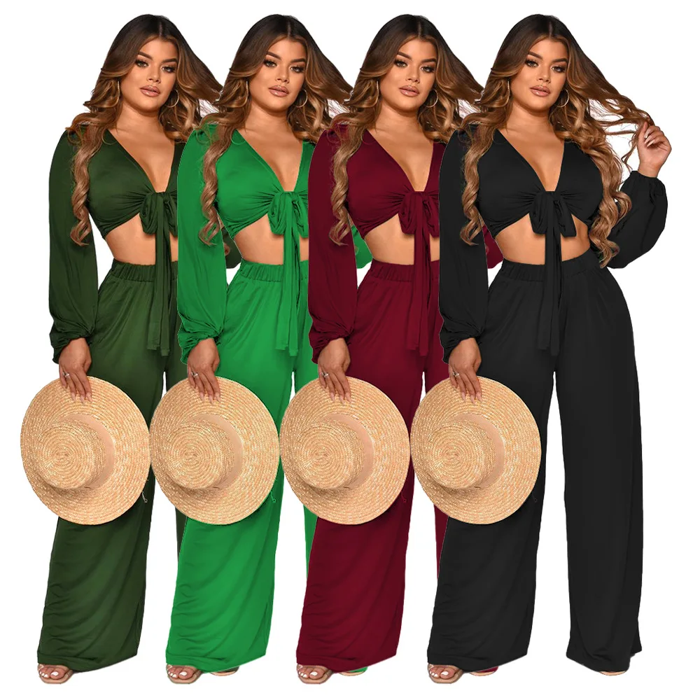 Women's Suit Summer New Fashion Women's Solid Color Sexy Long-sleeved Navel V-Neck Strappy Top + Trousers Two-Piece Set
Women's Suit Summer New Fashion Women's Solid Color Sexy Long-sleeved Navel V-Neck Strappy Top + Trousers Two-Piece Set