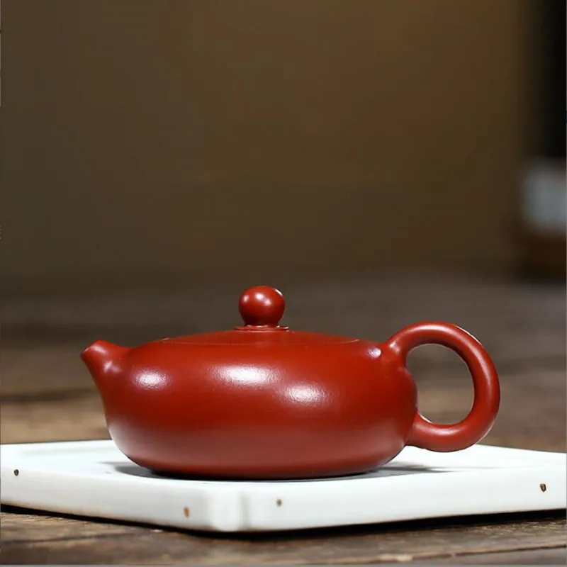 Yixing Classic Tea Pot purple clay filter Xishi teapot beauty kettle Raw ore Handmade Tea set Customized gifts authentic 170ml
Yixing Classic Tea Pot purple clay filter Xishi teapot beauty kettle Raw ore Handmade Tea set Customized gifts authentic 170ml