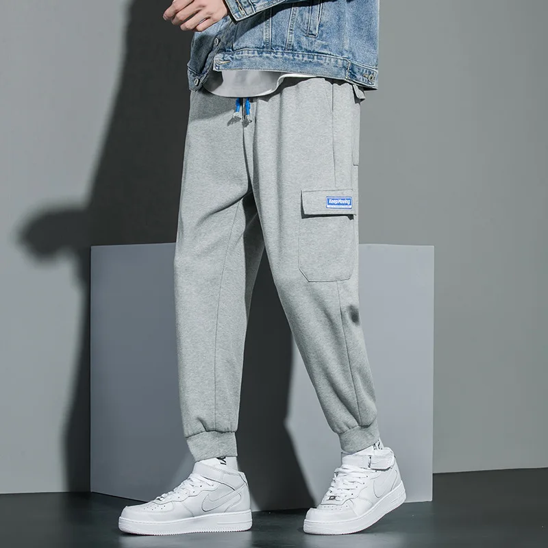 Брюки-карго мужские с эластичным поясом, повседневные свободные штаны, джоггеры с карманами в стиле хип-хоп, тренировочные штаны с манжетами 
Брюки-карго мужские с эластичным поясом, повседневные свободные штаны, джоггеры с карманами в стиле хип-хоп, тренировочные штаны с манжетами