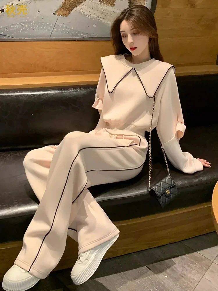 Женский спортивный костюм, Весенний Новый Повседневный пуловер со снижением возраста, свободный простой универсальный модный брюки с широкими штанинами
Женский спортивный костюм, Весенний Новый Повседневный пуловер со снижением возраста, свободный простой универсальный модный брюки с широкими штанинами