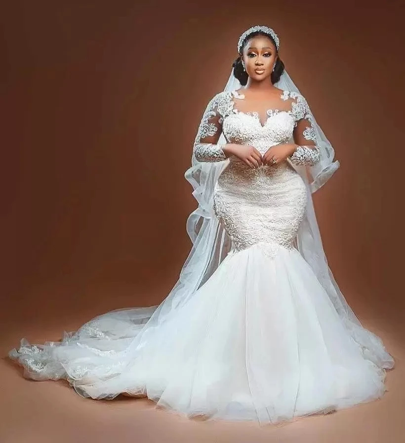 Plus Size Mermaid Wedding Dresses Bridal Gowns Sheer Neck Long Sleeve Lace Appliqued Sweep Train Robe de mariée 2023
Plus Size Mermaid Wedding Dresses Bridal Gowns Sheer Neck Long Sleeve Lace Appliqued Sweep Train Robe de mariée 2023