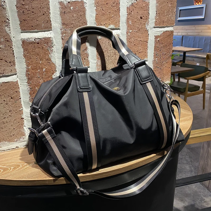 Oxford cloth large capacity duffel bag overnight bag folding portable light travel BaoChao unisex boarding
Oxford cloth large capacity duffel bag overnight bag folding portable light travel BaoChao unisex boarding