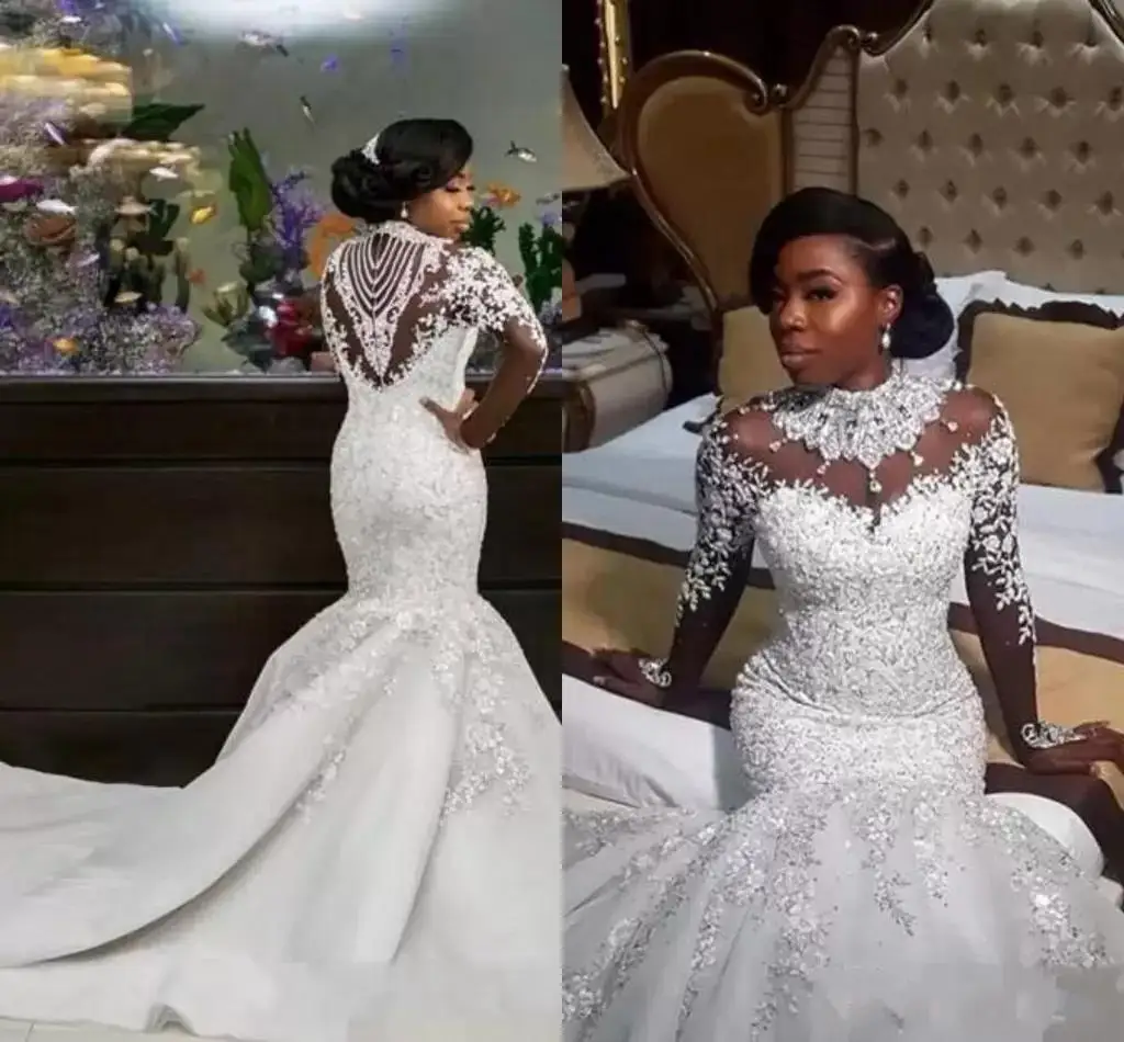 African Mermaid Wedding Dresses Long Sleeves High Neck Illusion Lace Appliques Crystal Beading Plus Size Custom Bridal Gown
African Mermaid Wedding Dresses Long Sleeves High Neck Illusion Lace Appliques Crystal Beading Plus Size Custom Bridal Gown