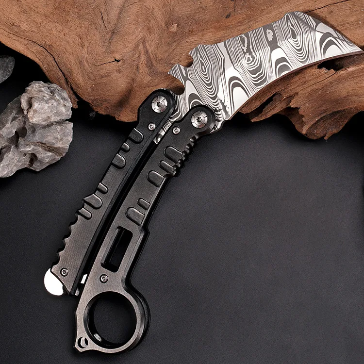 Outdoor survival folding knife high hardness bearing butterfly knife self-defense camping tactics knife knife outdoor knife
Outdoor survival folding knife high hardness bearing butterfly knife self-defense camping tactics knife knife outdoor knife