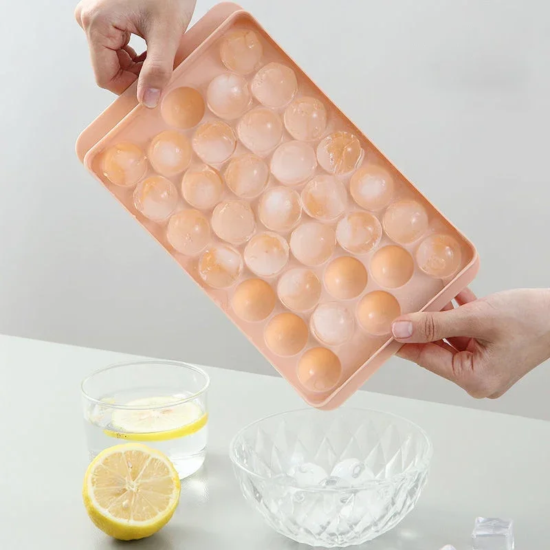 New 33 Ice Ball Mold Hockey Frozen Mini Ball Maker Mold Round Ice Cube Mold with Lid Ice Tray Box Whiskey Cocktail Kitchen Tools
New 33 Ice Ball Mold Hockey Frozen Mini Ball Maker Mold Round Ice Cube Mold with Lid Ice Tray Box Whiskey Cocktail Kitchen Tools