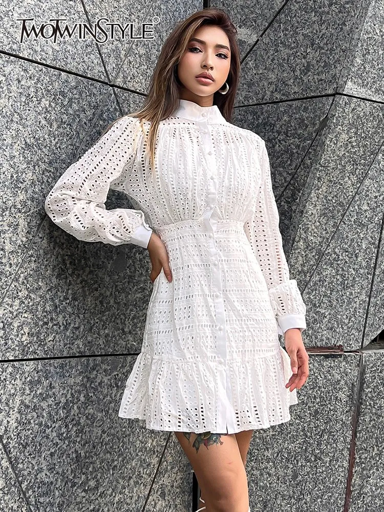 TWOTWINSTYLE Solid Hollow Out Dresses For Women Stand Collar Long Sleeve High Waist Patchwork Button Elegant Dress Female Style
TWOTWINSTYLE Solid Hollow Out Dresses For Women Stand Collar Long Sleeve High Waist Patchwork Button Elegant Dress Female Style