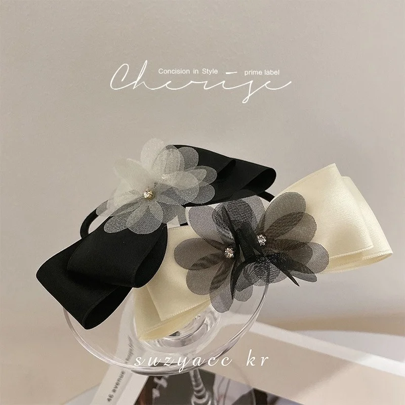 Korean temperament celebrity wind mesh flower satin bow hair ring niche exquisite tied hair head rope headwear female
Korean temperament celebrity wind mesh flower satin bow hair ring niche exquisite tied hair head rope headwear female