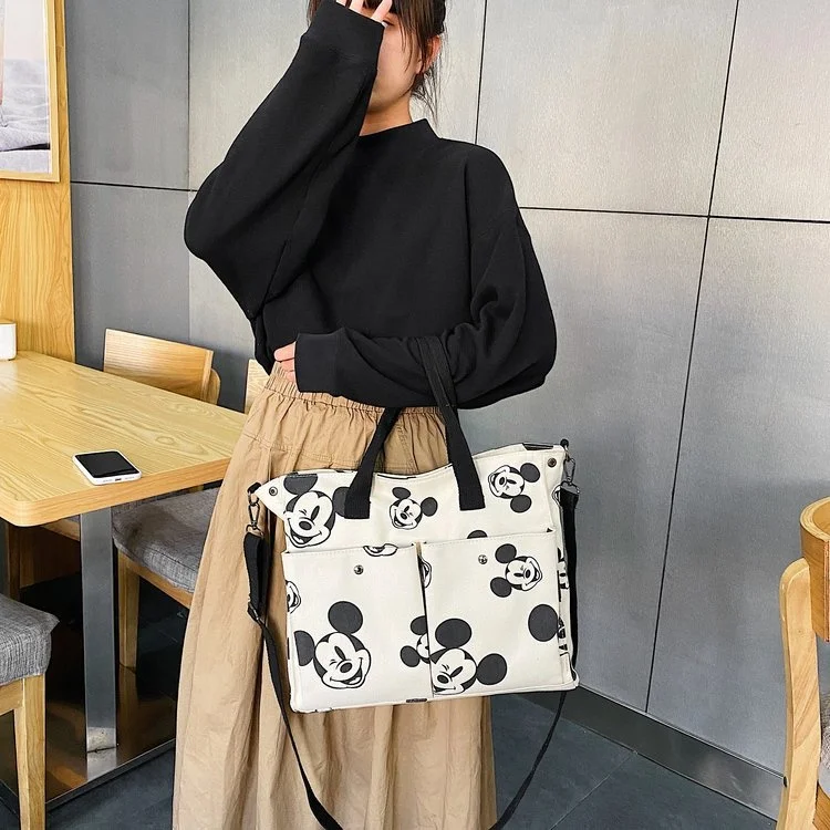 Disney Handbag Cartoon Mickey Mouse Canvas Bag New Messenger Bag Large Capacity Shoulder Bag Handbag
Disney Handbag Cartoon Mickey Mouse Canvas Bag New Messenger Bag Large Capacity Shoulder Bag Handbag