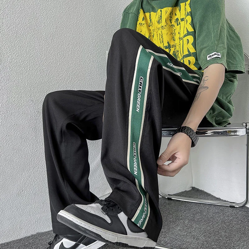 Hybskr Men Side Stripe Letter Straight Casual Pants Streetwear Drawstring Ice Silk Unisex Trousers Hip Hop Loose Pants
Hybskr Men Side Stripe Letter Straight Casual Pants Streetwear Drawstring Ice Silk Unisex Trousers Hip Hop Loose Pants