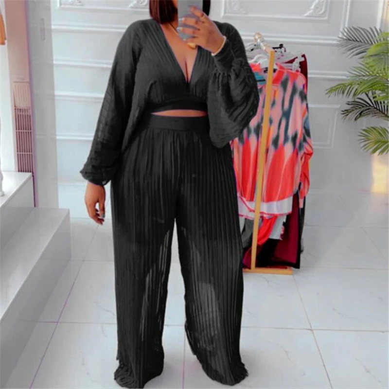 Summer dress Loose chiffon comfortable suit Perspective pressure plait Two sets of v-neck jacket and wide-leg pants
Summer dress Loose chiffon comfortable suit Perspective pressure plait Two sets of v-neck jacket and wide-leg pants