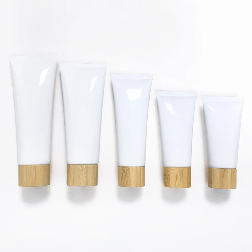 10 шт. оптовая продажа 2 унции 50 г 60 г 80 мл 100 мл 120 г белая черная зеленая Косметическая трубка пустая бутылка бамбуковая крышка 
10 шт. оптовая продажа 2 унции 50 г 60 г 80 мл 100 мл 120 г белая черная зеленая Косметическая трубка пустая бутылка бамбуковая крышка
