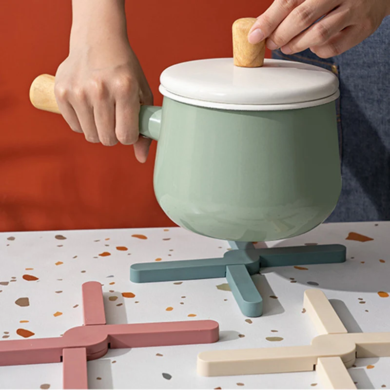 Silicone Heat Resistant Pad Foldable Non-Slip Pot Pan Mat Table Placemat Dish Plate Cross Holder Coaster Kitchen Table Trivet 
Silicone Heat Resistant Pad Foldable Non-Slip Pot Pan Mat Table Placemat Dish Plate Cross Holder Coaster Kitchen Table Trivet