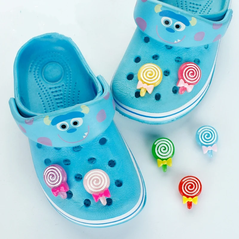 Single Sale 1pcs Lollipop Resin Shoe Charms Novel Colorful Croc Sandals Accessories Wristwand Decor Children Party Favors Gifts
Single Sale 1pcs Lollipop Resin Shoe Charms Novel Colorful Croc Sandals Accessories Wristwand Decor Children Party Favors Gifts