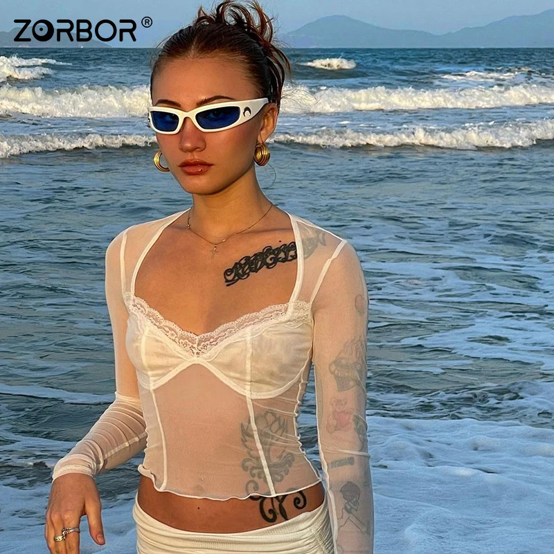 ZORBOR Lace Long Sleeve Top Women Summer Shirt Sexy Mesh Perspective Black White Women Clothes
ZORBOR Lace Long Sleeve Top Women Summer Shirt Sexy Mesh Perspective Black White Women Clothes