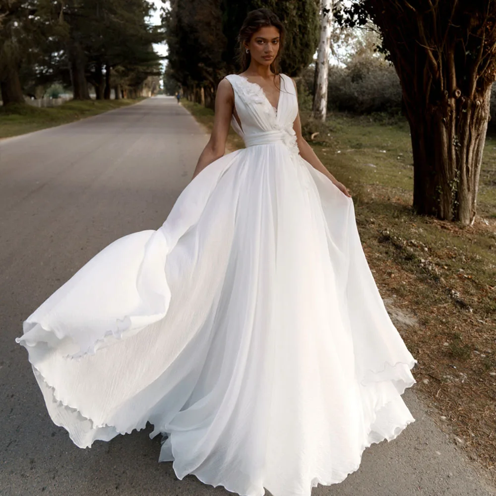 Boho Wedding Dresses V-Neck Backless 3D Flowers Sleeveless Bride Gowns Chiffon Empire A-Line Sweep Train Vestido De Noiva
Boho Wedding Dresses V-Neck Backless 3D Flowers Sleeveless Bride Gowns Chiffon Empire A-Line Sweep Train Vestido De Noiva