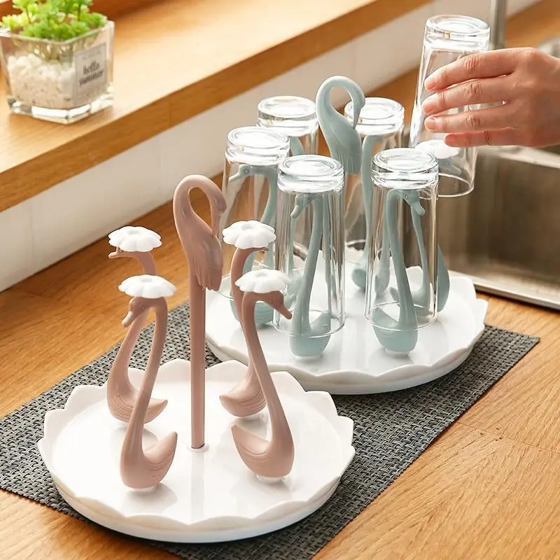 Glass Cup Storage Rack Rotating 6cells Water Cup Hanger Creative Swan Drain Tray Teacup Organizer Livingroom Kitchen Accessories
Glass Cup Storage Rack Rotating 6cells Water Cup Hanger Creative Swan Drain Tray Teacup Organizer Livingroom Kitchen Accessories