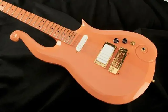 Diamond Series Prince Cloud Peach Electric Guitar White Pickups, Black Spade Inlay, Gold Truss Rod Cover, Black Knobs
Diamond Series Prince Cloud Peach Electric Guitar White Pickups, Black Spade Inlay, Gold Truss Rod Cover, Black Knobs