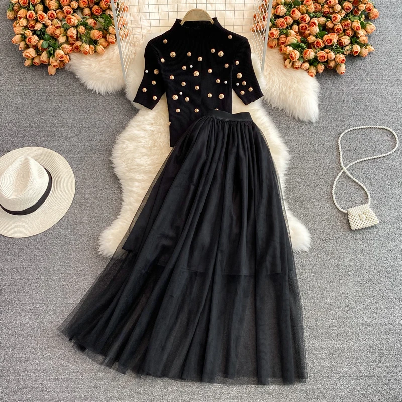 Mesh A-Line Skirt High Waist Slim All-match Mid-Length Skirt Two-piece Suit Stand Collar Short Knit Top
Mesh A-Line Skirt High Waist Slim All-match Mid-Length Skirt Two-piece Suit Stand Collar Short Knit Top