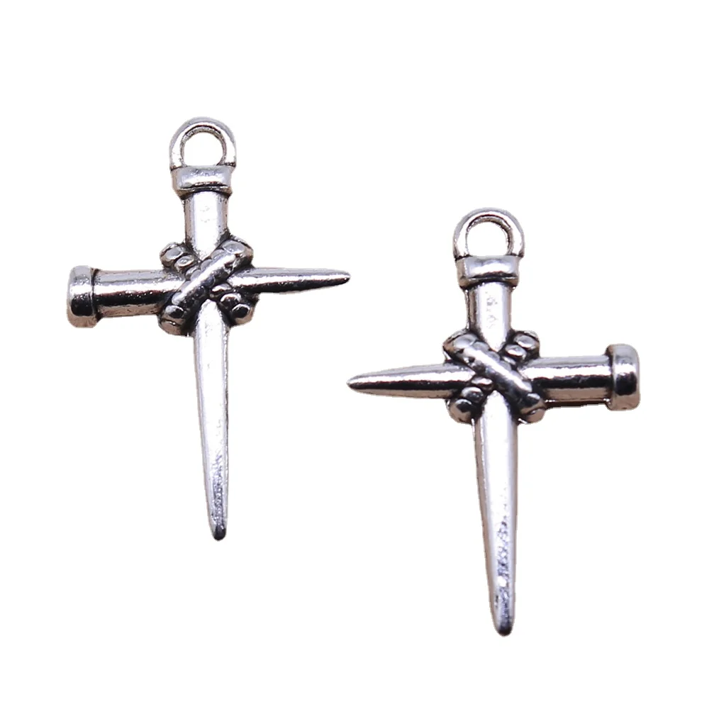 20Pcs/lot Antique Silver Color Nails Cross Charms Pendant Craft for DIY Jewelry Making Accessories 22x16mm
20Pcs/lot Antique Silver Color Nails Cross Charms Pendant Craft for DIY Jewelry Making Accessories 22x16mm
