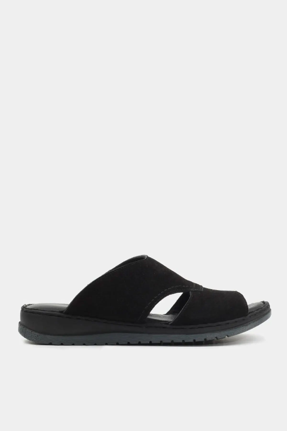 Черные женские тапочки из натуральной кожи 
Черные женские тапочки из натуральной кожи