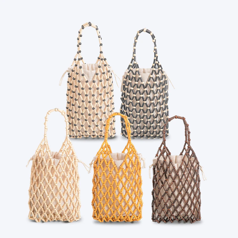 Summer Women's Hollow Out Tote Bag Designer Hand-Woven Wooden Beaded Bag Bohemia Beach Seaside Holiday Handbag Sac A Main Femme
Summer Women's Hollow Out Tote Bag Designer Hand-Woven Wooden Beaded Bag Bohemia Beach Seaside Holiday Handbag Sac A Main Femme