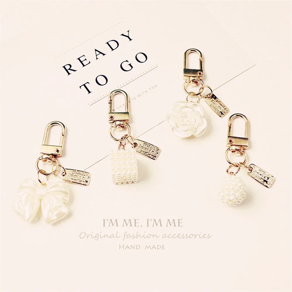 Fashion Rose Bowknot Pearl Keychain Camellia Flower Exquitiat Tassel Keyring Accessories for Women Earphone Case Decoration Gift
Fashion Rose Bowknot Pearl Keychain Camellia Flower Exquitiat Tassel Keyring Accessories for Women Earphone Case Decoration Gift