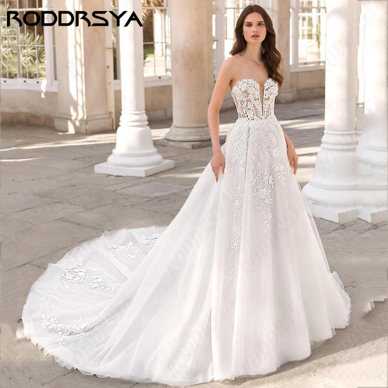 Женское свадебное платье из тюля RODDRSYA, элегантное ТРАПЕЦИЕВИДНОЕ кружевное платье с открытой спиной, на тонких бретельках, кружевное платье для невесты элегантное ТРАПЕЦИЕВИДНОЕ кружевное платье с открытой спиной,
Женское свадебное платье из тюля RODDRSYA, элегантное ТРАПЕЦИЕВИДНОЕ кружевное платье с открытой спиной, на тонких бретельках, кружевное платье для невесты элегантное ТРАПЕЦИЕВИДНОЕ кружевное платье с открытой спиной,