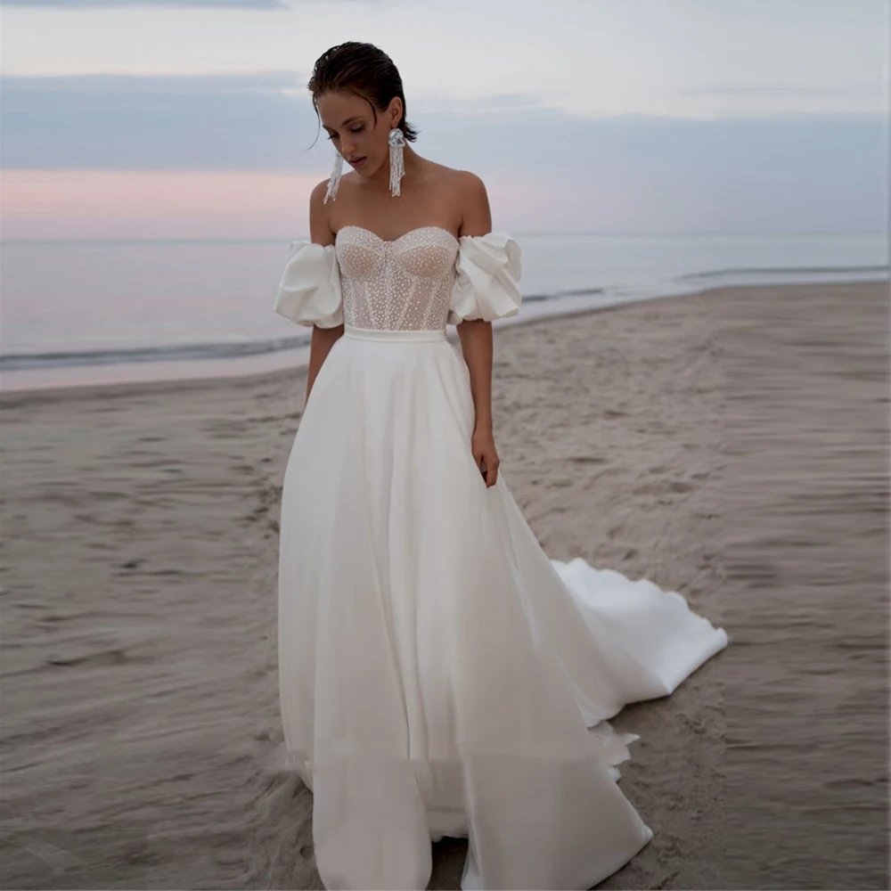 Beach Satin Wedding Dress 2022 Elegant A-Line Sweetheart Neck Short Sleeves Backless With Beading Bridal Gown Vestido De Novia 
Beach Satin Wedding Dress 2022 Elegant A-Line Sweetheart Neck Short Sleeves Backless With Beading Bridal Gown Vestido De Novia
