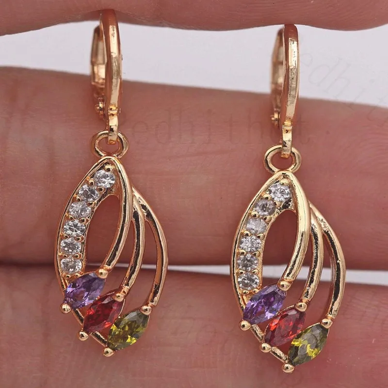 Simple and Gorgeous Artificial Amethyst Peridot Ruby Leaf Hollow Earrings Women's Fashion Sweet Inlaid Zircon Pendant Earrings
Simple and Gorgeous Artificial Amethyst Peridot Ruby Leaf Hollow Earrings Women's Fashion Sweet Inlaid Zircon Pendant Earrings
