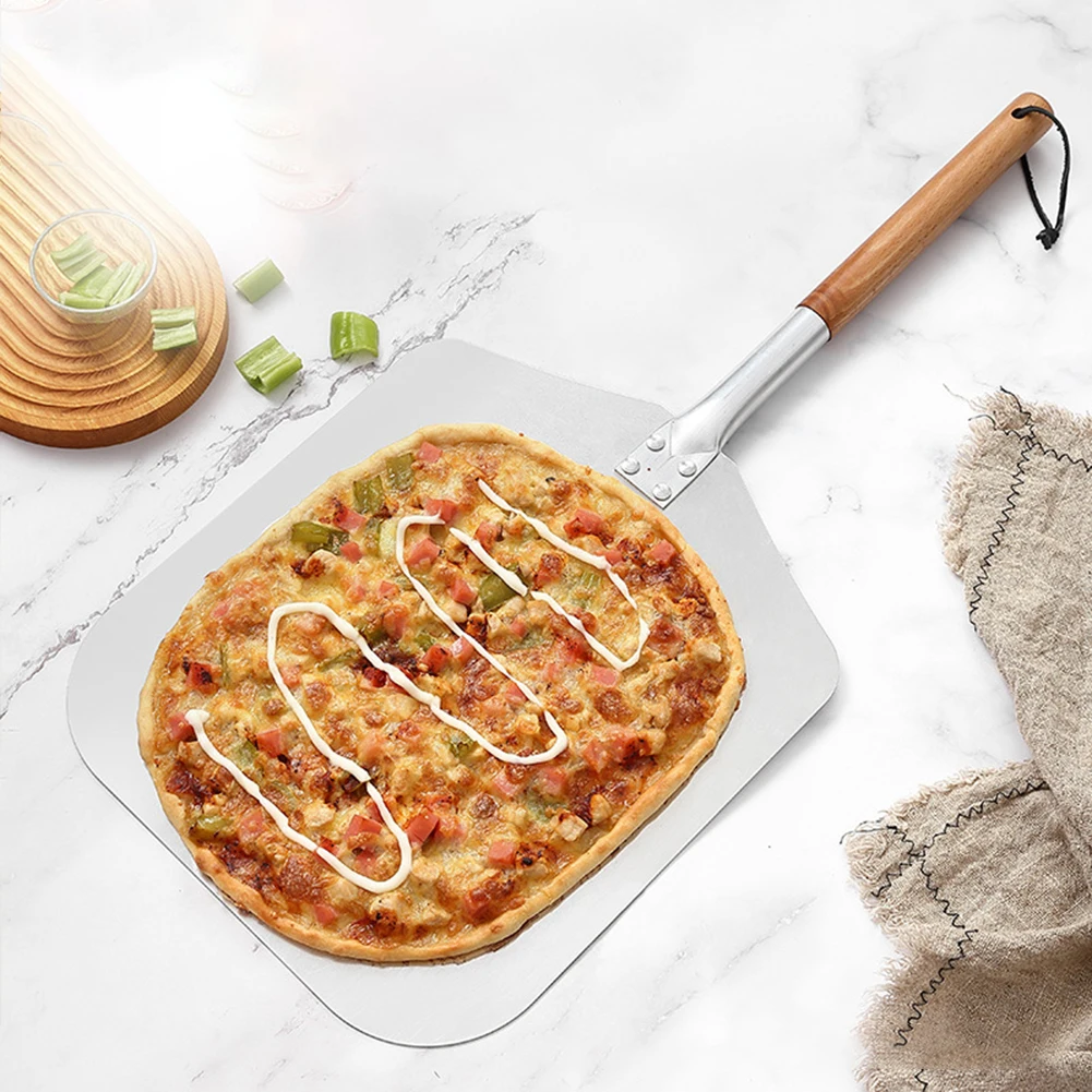 65 cm Aluminum Pizza Shovel with Wooden Handle Pala Cake Baking Tools Accessory Pizza Knife Cheese Cutter Peels Shovel
65 cm Aluminum Pizza Shovel with Wooden Handle Pala Cake Baking Tools Accessory Pizza Knife Cheese Cutter Peels Shovel