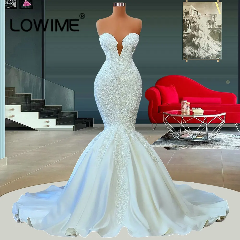 Свадебные платья с длинными рукавами, жемчугом, юбкой-годе и съемным шлейфом, сатиновые Свадебные платья на заказ
Свадебные платья с длинными рукавами, жемчугом, юбкой-годе и съемным шлейфом, сатиновые Свадебные платья на заказ