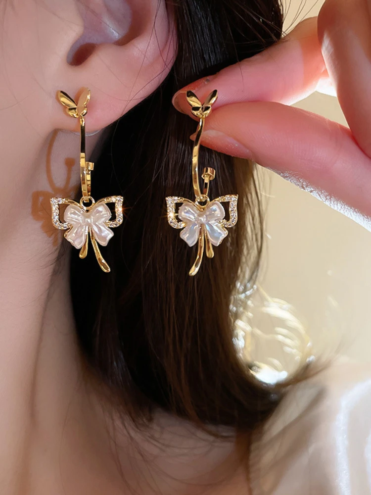 New zircon bow earrings female small sweet wind fashion design earrings earrings temperament light luxury versatile earrings
New zircon bow earrings female small sweet wind fashion design earrings earrings temperament light luxury versatile earrings