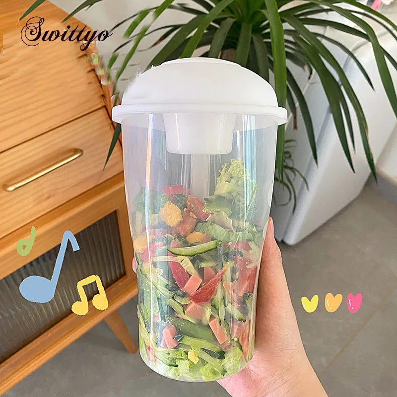 Portable Salad Cup with Lid Fork Plastic Bottle Breakfast Oatmeal Nut Yogurt Lunch-to-Go Container Sauce Food Bento Lunch Box 
Portable Salad Cup with Lid Fork Plastic Bottle Breakfast Oatmeal Nut Yogurt Lunch-to-Go Container Sauce Food Bento Lunch Box