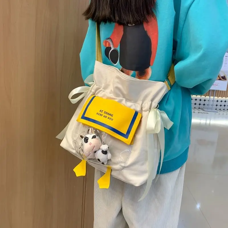 MBTI Women Canvas Cute Cartoon Cow Shoulder Bag Korean Style Casual Designer Female Bucket Bag Protable Lipstick Purse for Girls
MBTI Women Canvas Cute Cartoon Cow Shoulder Bag Korean Style Casual Designer Female Bucket Bag Protable Lipstick Purse for Girls