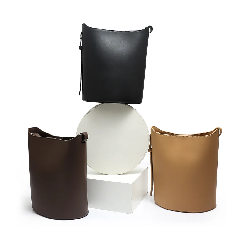 

Simple Fashion Versatile Single Shoulder Bag Senior Cross Women's Bag Commuter Large Capacity Cowhide Solid Colour Bucket Bag