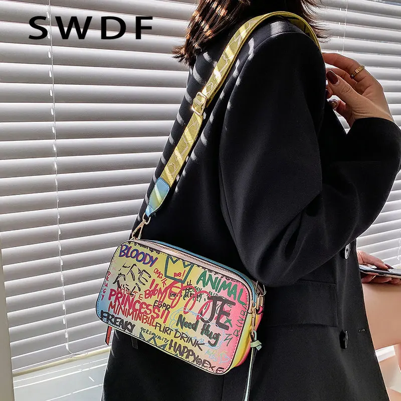 Дизайнерские женские маленькие кошельки из искусственной кожи, дорожная дамская сумочка на плечо с граффити, модные женские сумки через пл...
Дизайнерские женские маленькие кошельки из искусственной кожи, дорожная дамская сумочка на плечо с граффити, модные женские сумки через пл...