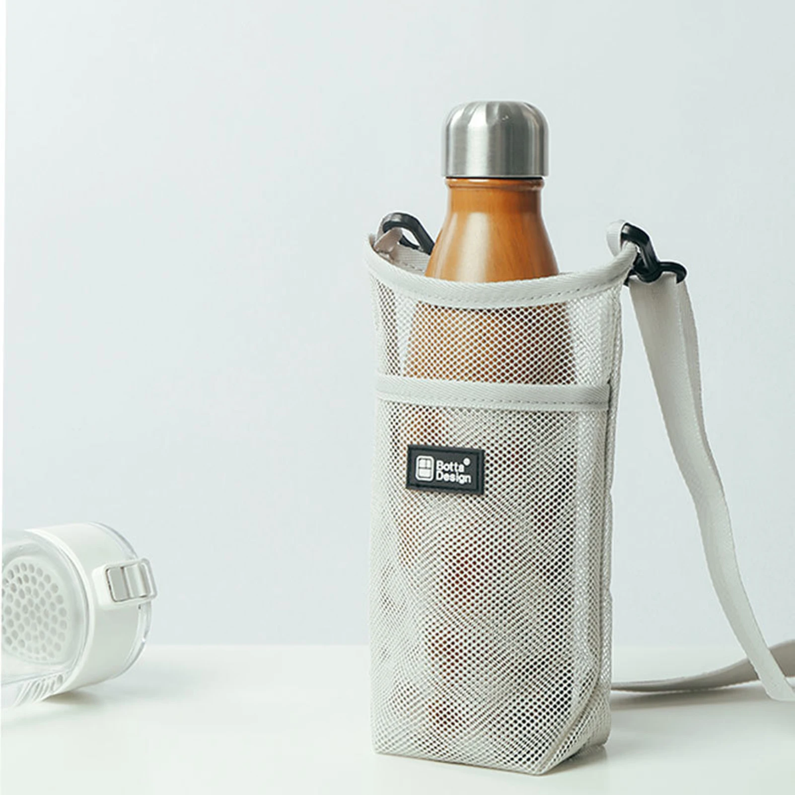 Bottle Cover Fashion Cup Mug Holder Bag Water Bottle Carry Mesh Net Bag Portable Cup Pouch Adjustable Mesh Water Bottle Bag
Bottle Cover Fashion Cup Mug Holder Bag Water Bottle Carry Mesh Net Bag Portable Cup Pouch Adjustable Mesh Water Bottle Bag